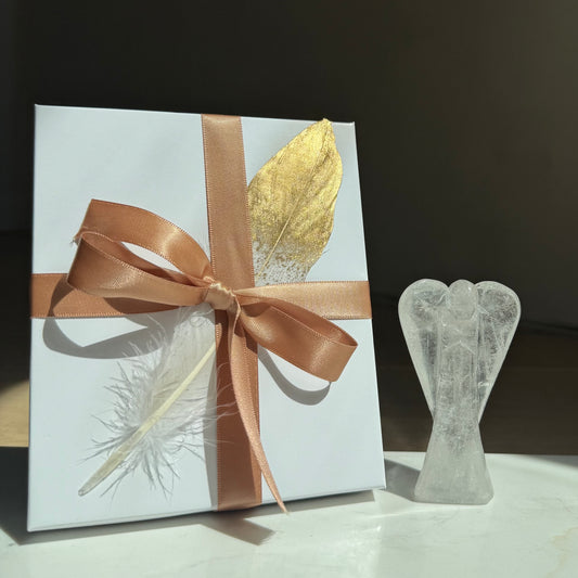 Guardian of Light Clear Quartz crystal angel with ribbon-tied keepsake gift box — gift-ready healing crystal for sympathy and milestone gifts