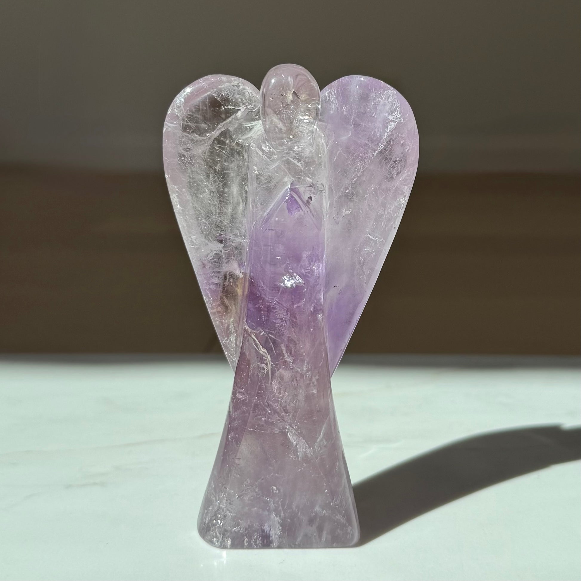 Guardian of Peace — hand-carved Amethyst crystal angel, artisan healing crystal keepsake symbolizing inner peace, calm and spiritual protection.