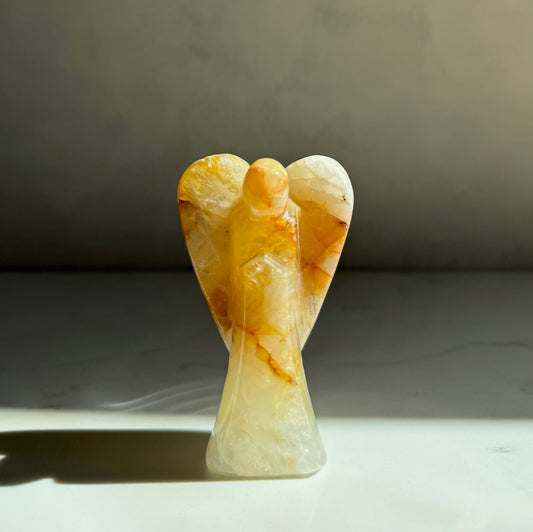 Guardian of Healing — hand-carved Golden Healer Quartz crystal angel, artisan healing crystal gift symbolizing strength, protection and hope