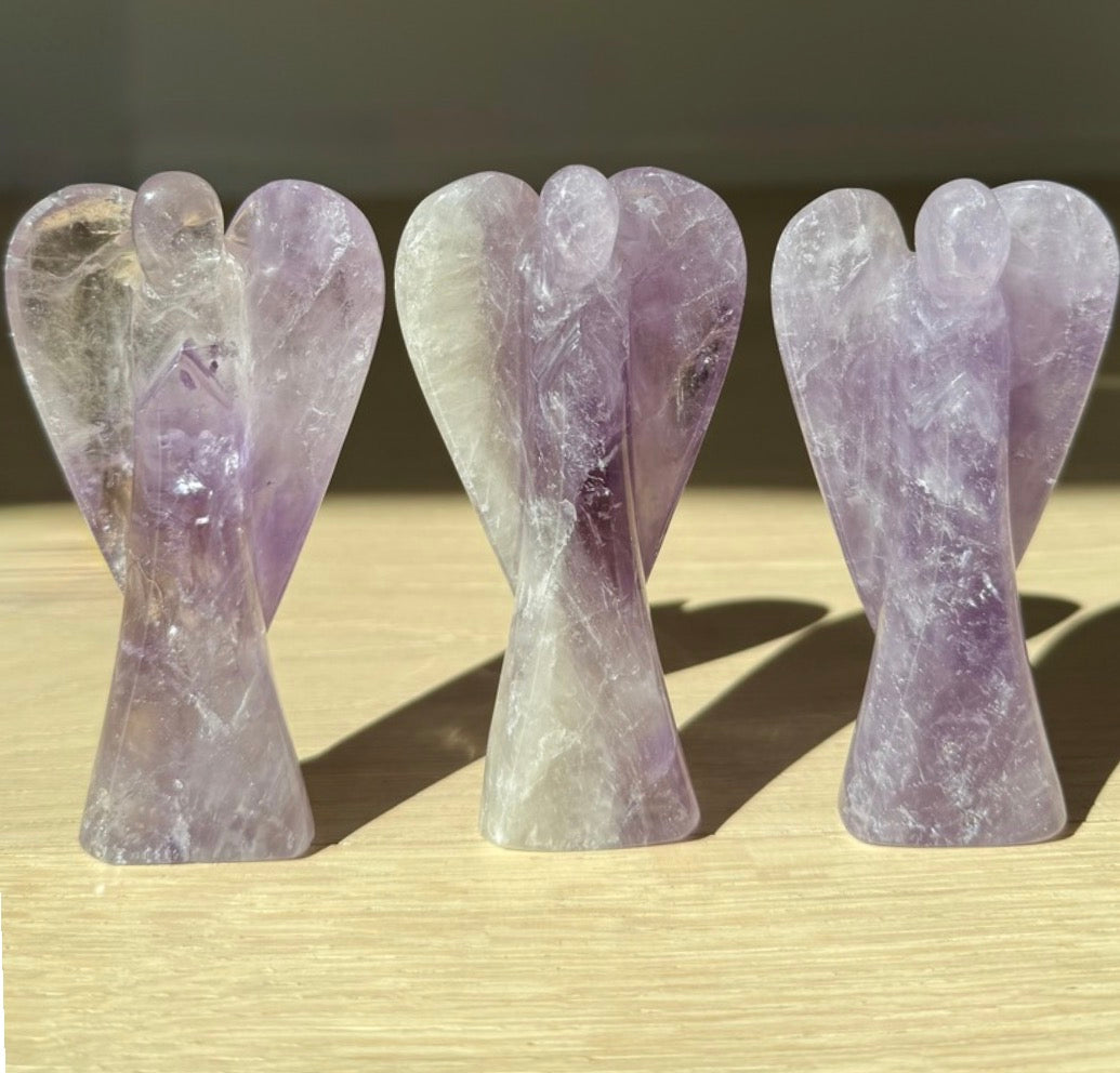 Three amethyst crystal angels. The guardian of peace by Aspen angels foundation. A crystal angel for calm, peace, tranquility and healing. 
